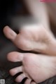 A close up of a baby's hand and foot.