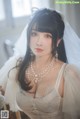 Coser@rioko凉凉子 Vol.073: 透明婚纱 (39 photos) P22 No.4230ca